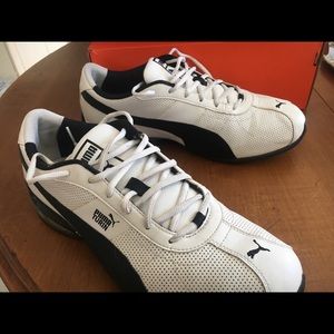 Good condition . Size 11 Puma Turin White & black
